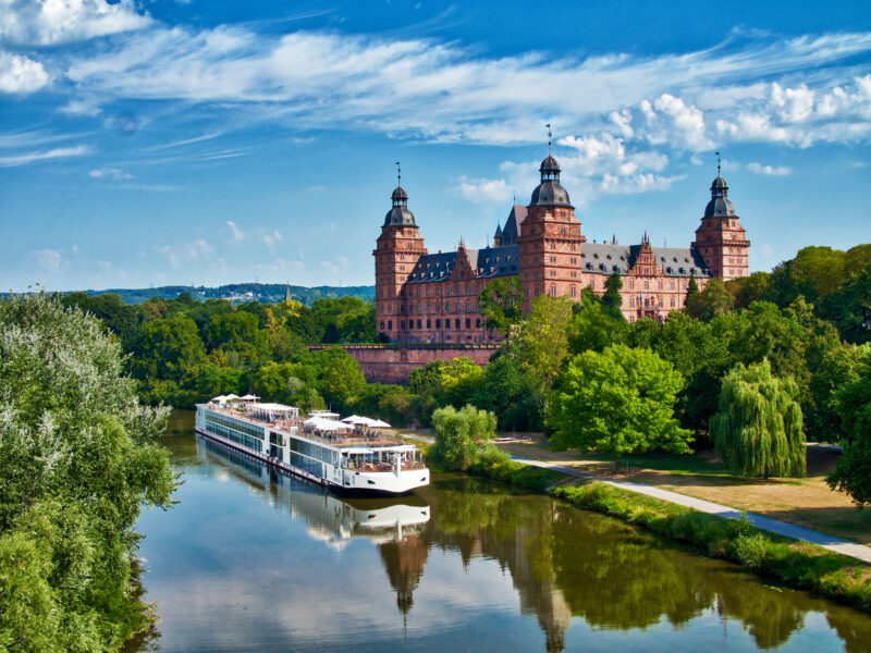 Which Cruise Line is Right For YOU? 7 ship on river next to castle which cruise line is right for you?