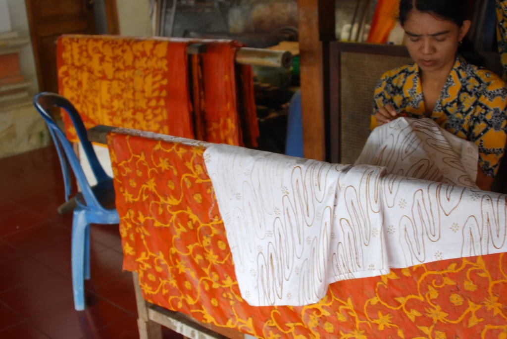Photo of a Hand Painting Batik worker
