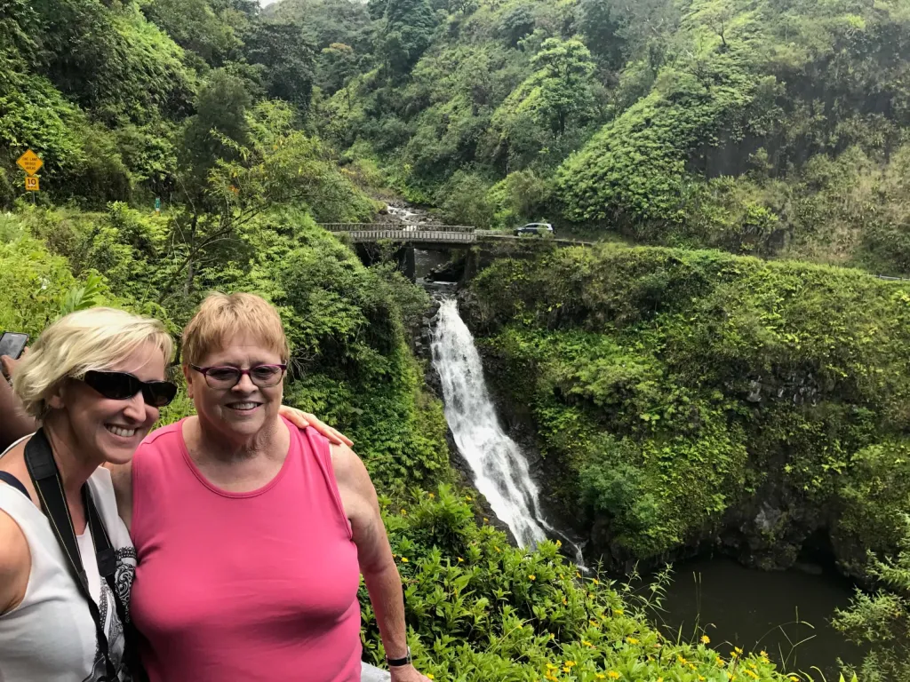 Photo of Jennifer and her mother at a falls in Hawaii