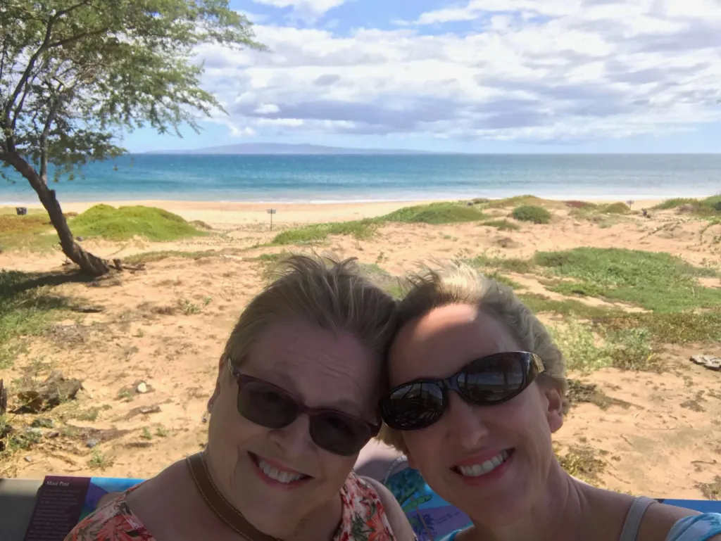 Photo of Jennifer and her mother a beach in hawaii