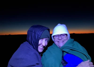 Photo of Jennifer and her mother during sunrise on Haleakala