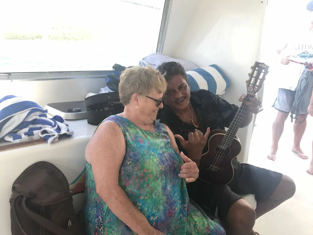 Photo of Jennifer's mother with a guy with a ukulele