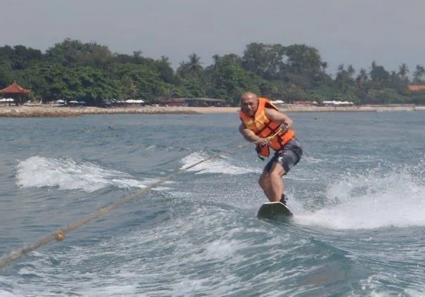 Photo of Jennifer's husband water skiing