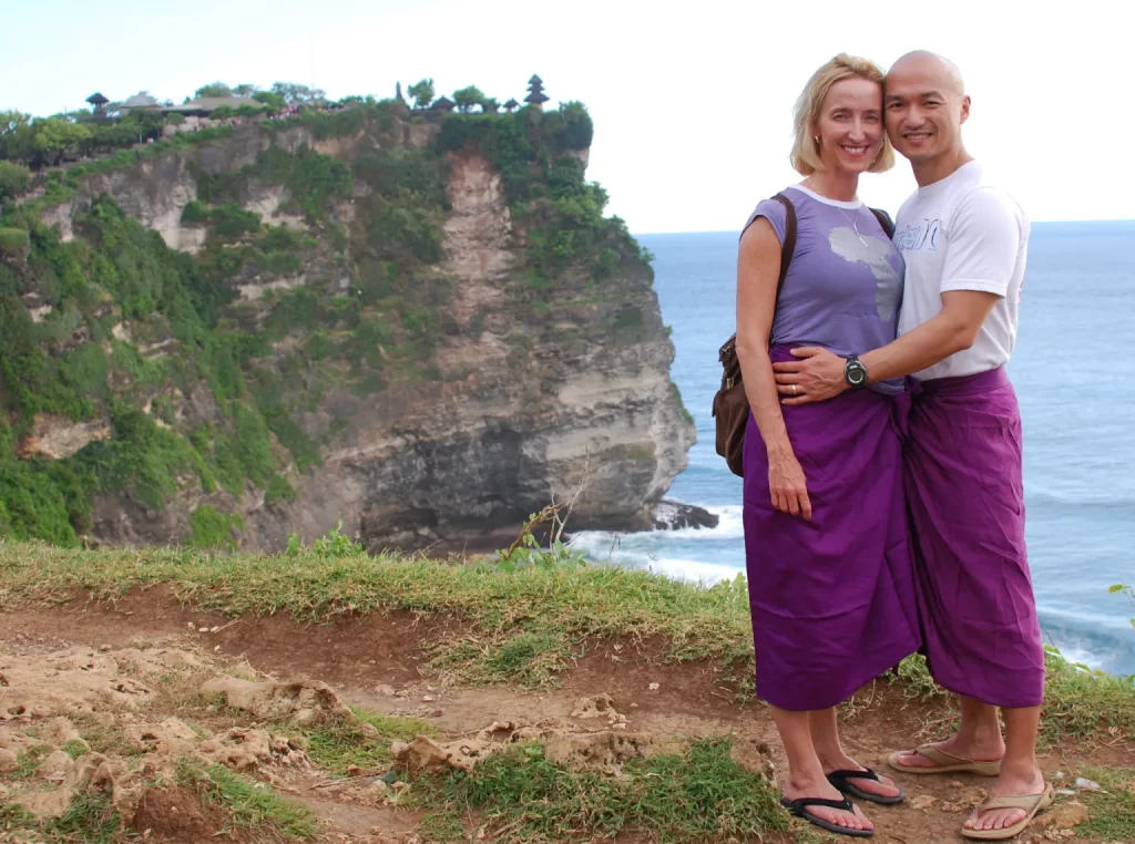 Photo of Jennifer and her husband at a cliff at Uluwatu