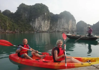 Photo of Jennifer and her husband in a kayak in Vietnam