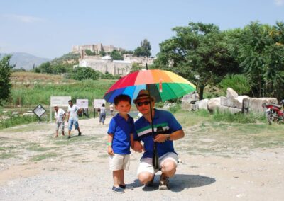 Boy and Dad with rainbow umbrella, Temple of Artemis