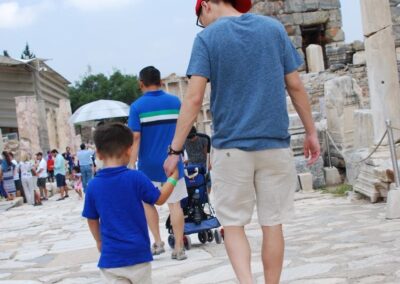 Cousins walking hand in hand at Ephesus, Turkey