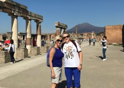 Two women in main square at ancient city