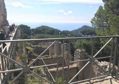 View of ruins by the sea from an elevated location