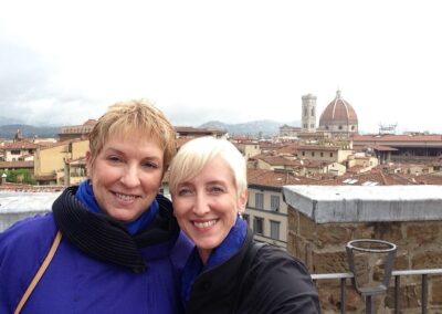 Two women with backdrop of duomo and city of Florence