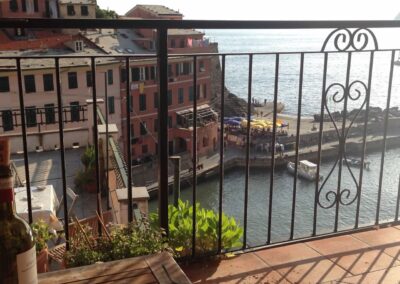 View of coastal town and sea from balcony