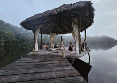 Yoga under gazebo by lake