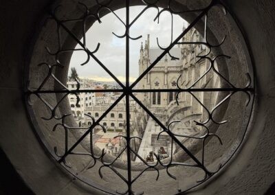city as seen through a round window